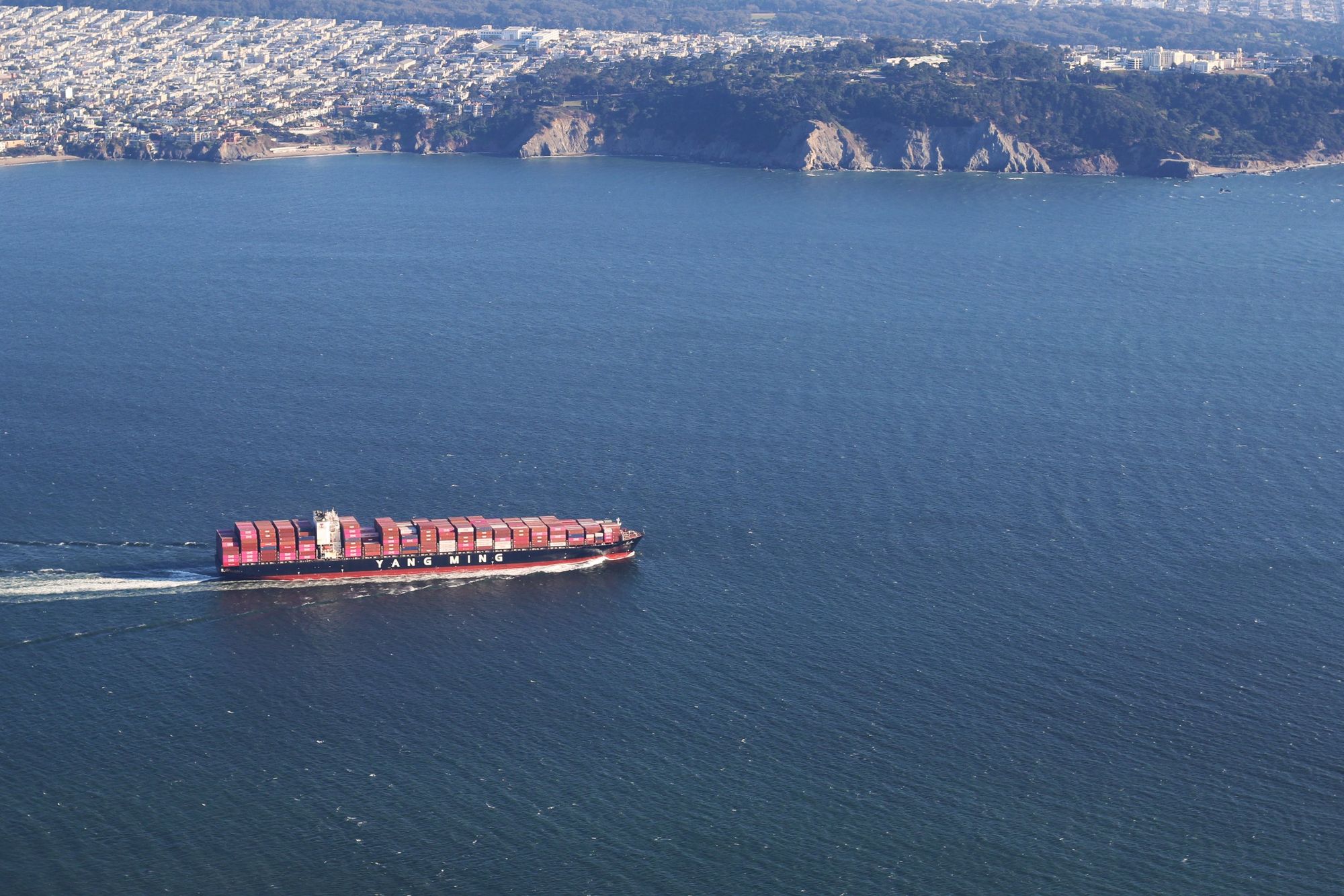Container ship arriving on the Pacific coast of the United States